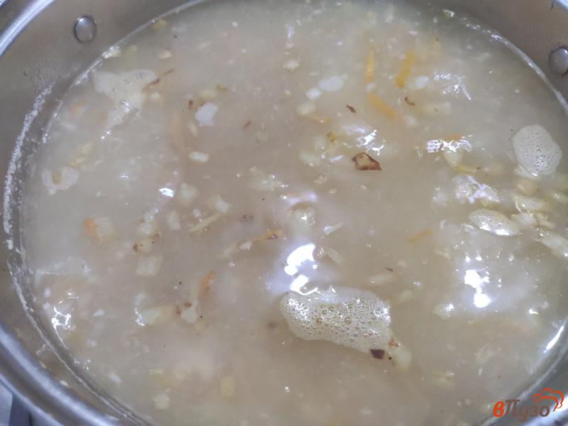 Фото приготовление рецепта: Картофельный суп с курицей и плавлеными сырками шаг №7