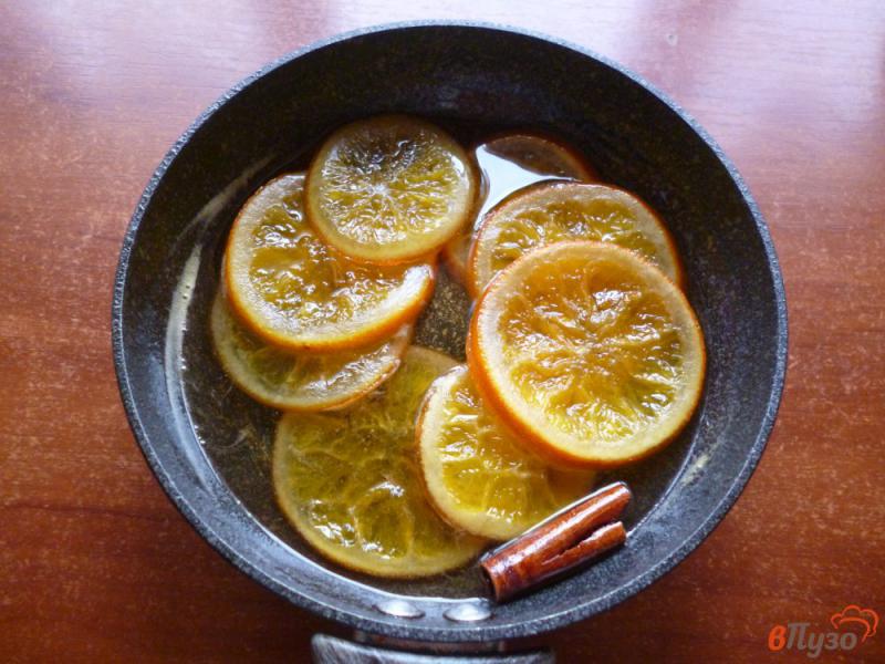 Фото приготовление рецепта: Карамелизированные апельсины в шоколаде шаг №5