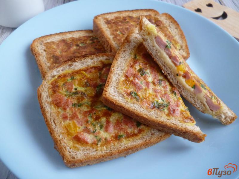 Фото приготовление рецепта: Горячие бутерброды на сковороде шаг №9
