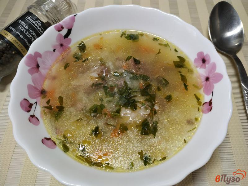 Фото приготовление рецепта: Рисовый суп со свиной тушенкой шаг №9