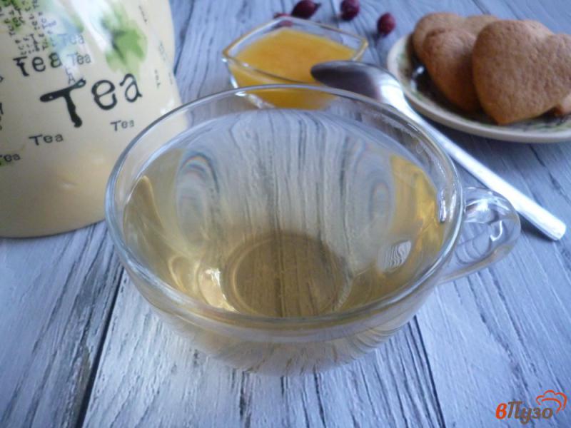 Фото приготовление рецепта: Витаминный чай из шиповника шаг №5