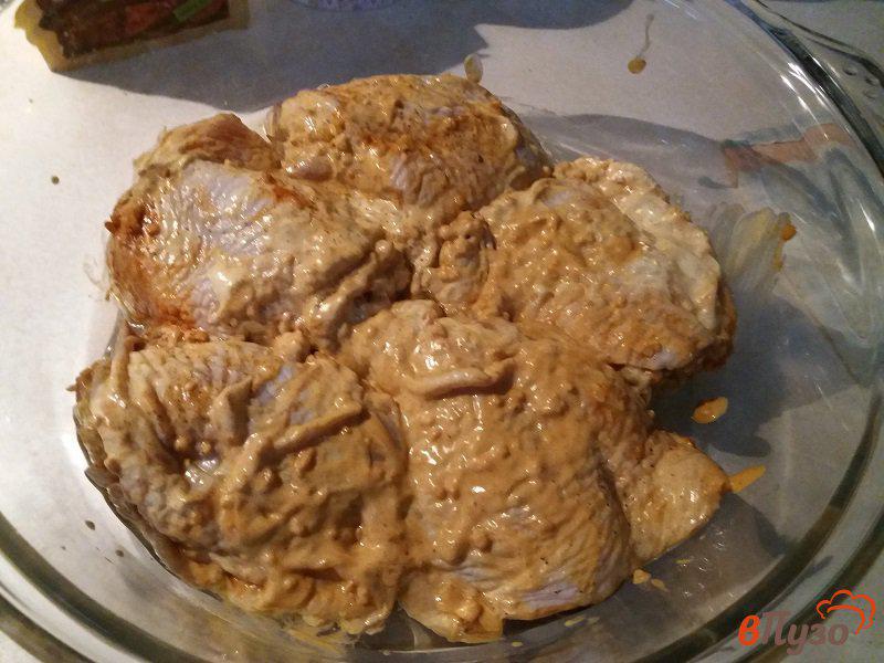 Фото приготовление рецепта: Запечённые куриные бёдра в маринаде шаг №4