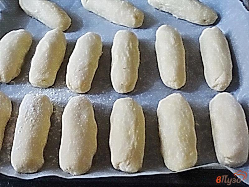 Фото приготовление рецепта: Запеченные сосиски в картофельном тесте шаг №6