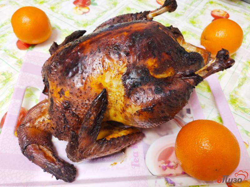 Фото приготовление рецепта: Курица запёченная с апельсинами шаг №7