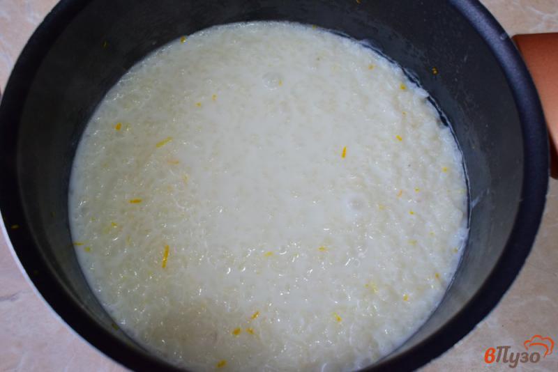 Фото приготовление рецепта: Рисовая каша с тыквой и апельсином шаг №4