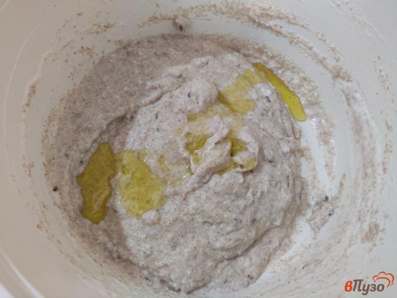 Фото приготовление рецепта: Цельнозерновой хлеб на кефире с семенами льна шаг №3