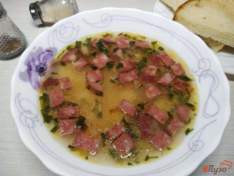 Фото приготовление рецепта: Суп с вермешелью и копченой колбасой шаг №9
