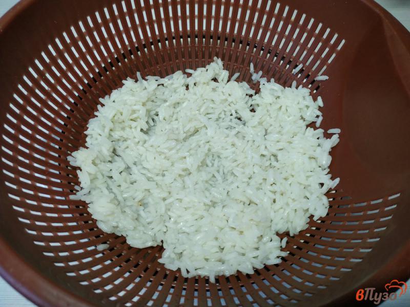 Фото приготовление рецепта: Кутья из риса цукатов и изюма шаг №3