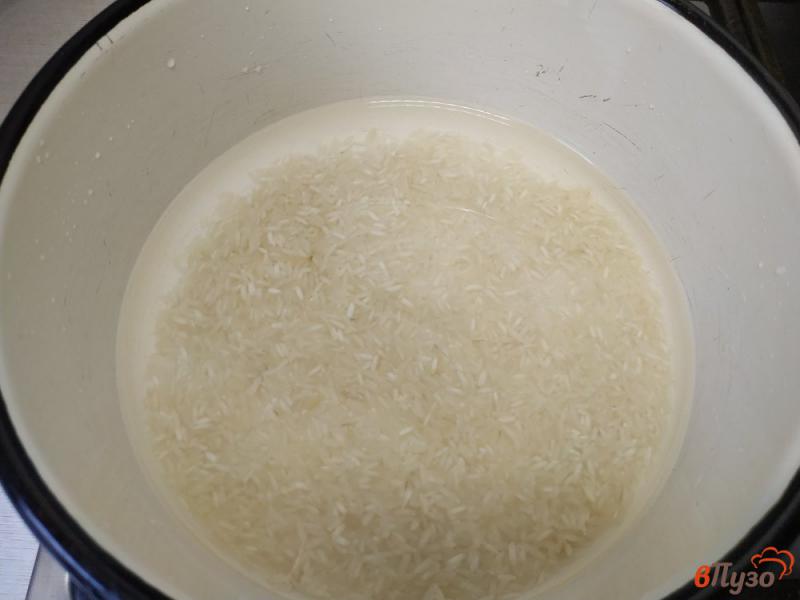 Фото приготовление рецепта: Кутья из риса цукатов и изюма шаг №2
