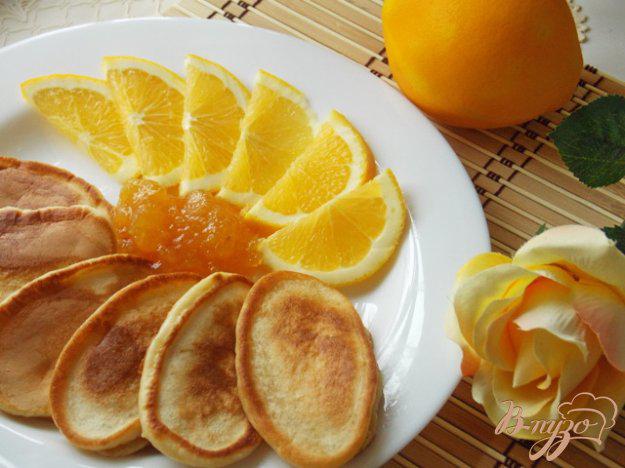 фото рецепта: Апельсиновые оладьи на ряженке