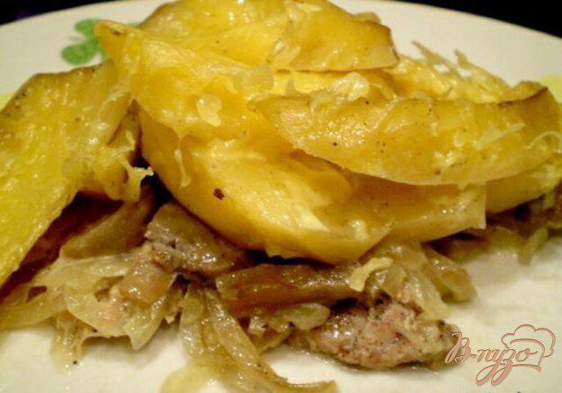 фото рецепта: Картофель с мясом и грибами запеченный под сыром