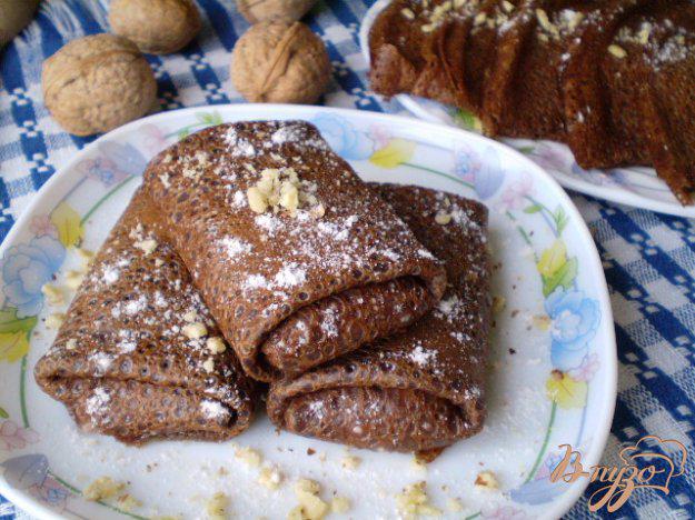фото рецепта: Шоколадные блинчики с начинкой запеченные в духовке