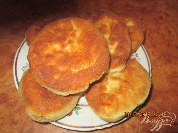фото рецепта: Жареные пирожки на кефире с капустой