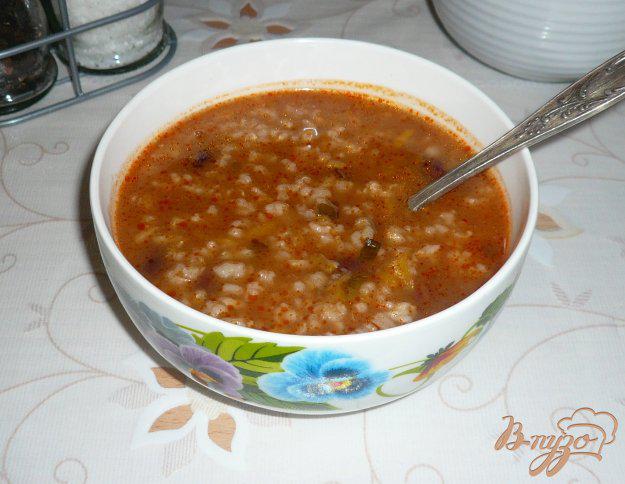 фото рецепта: Рисовый томатный суп с фасолью