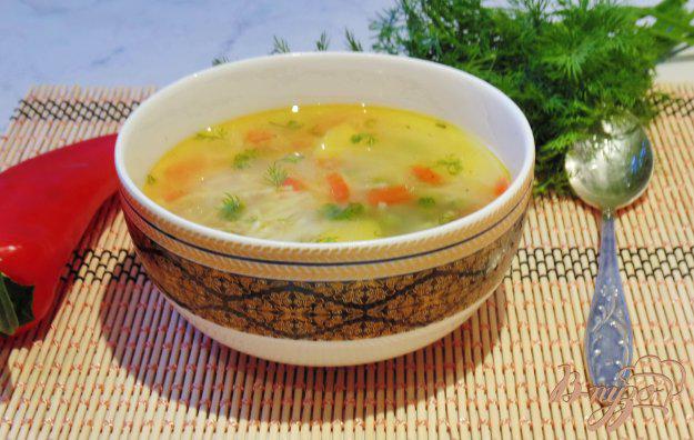 фото рецепта: Куриный суп с вермишелью и зеленым горошком