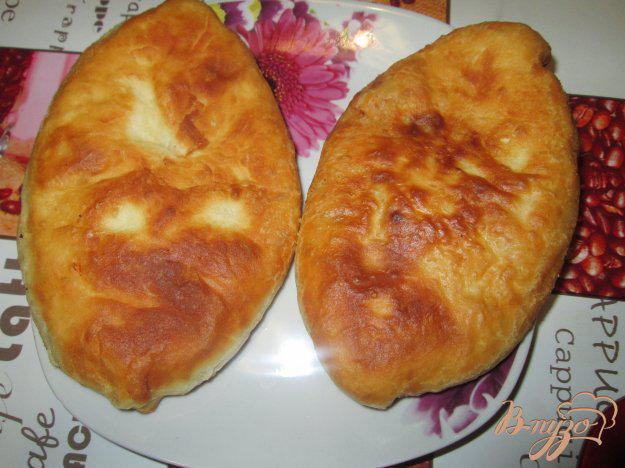 фото рецепта: Пирожки с картошкой и фаршем на сковороде
