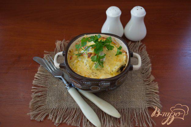 фото рецепта: Минтай под сметаной и сыром в духовке