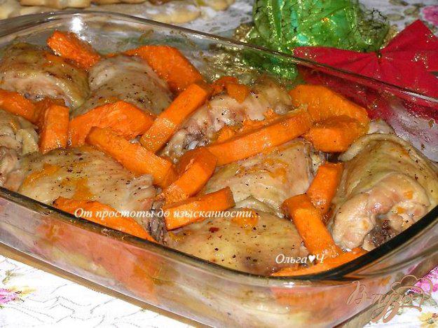 фото рецепта: Куриные бедра, запеченные с тыквой