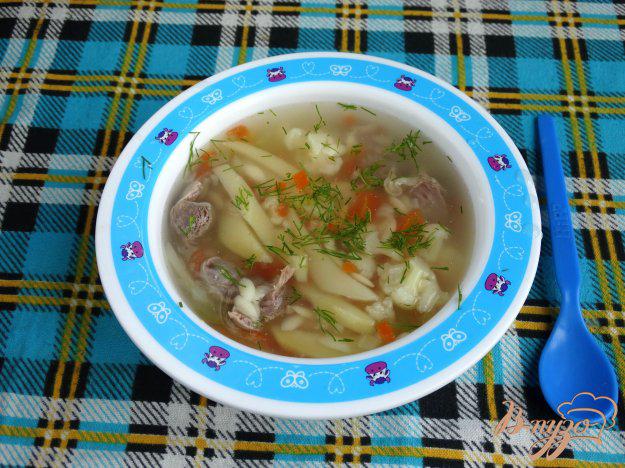 фото рецепта: Суп с куриными желудочками и орзо