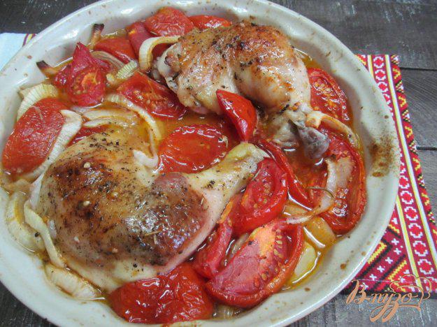 фото рецепта: Куриные окорока в помидорах