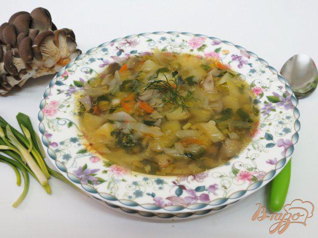 фото рецепта: Суп с грибами, горошком и черемшой