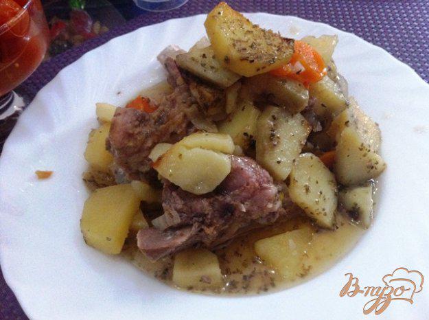фото рецепта: Свиные ребрышки запеченные с картофелем