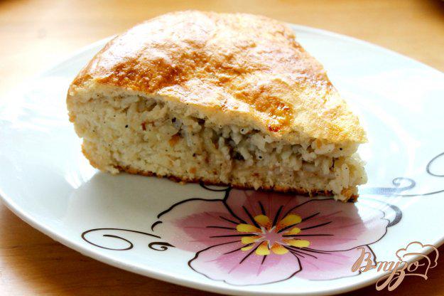 фото рецепта: Пирог с сардины, рисом и луком