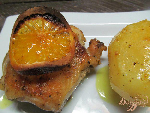 фото рецепта: Курица под апельсином с пряностями