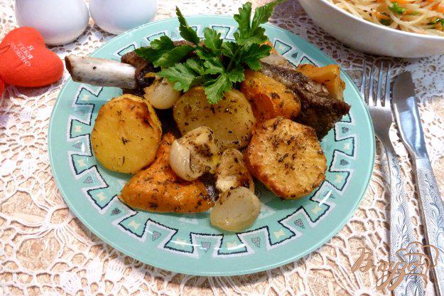 фото рецепта: Свиные ребрышки,запеченные с картофелем и тыквой в рукаве