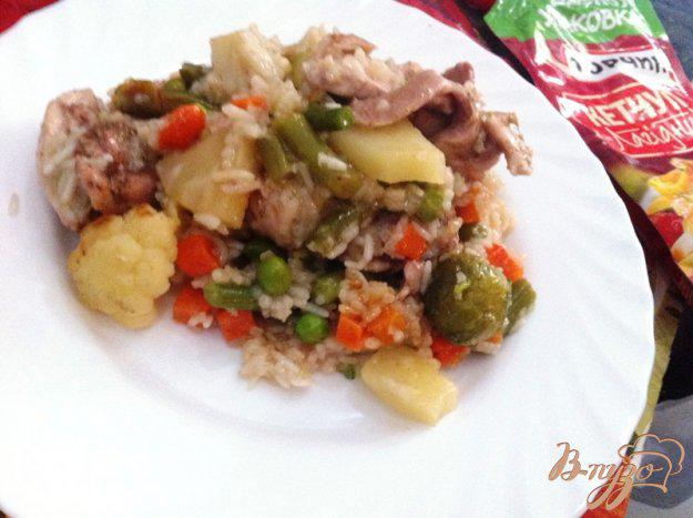 фото рецепта: Запеченная курица срисом, ананасом и овощами