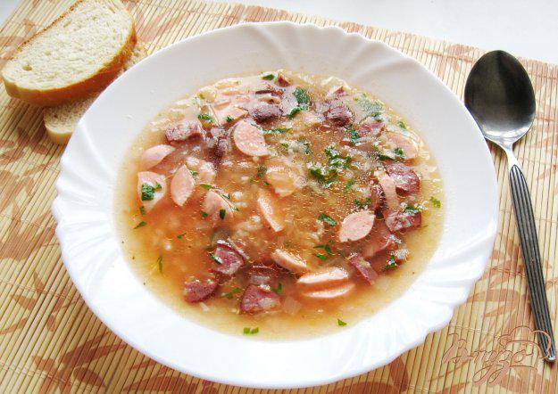 фото рецепта: Рисовый суп с колбасой и сосисками