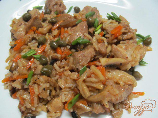 фото рецепта: Свинина с овощами и рисом в мультиварке