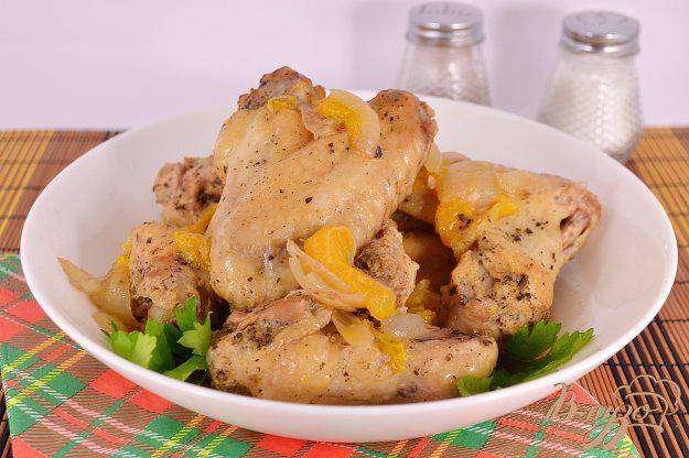 фото рецепта: Куриные крылышки с мандаринами запеченные в рукаве