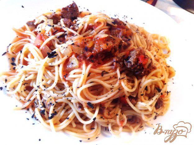фото рецепта: Спагетти с соусом из говяжьей тушенки