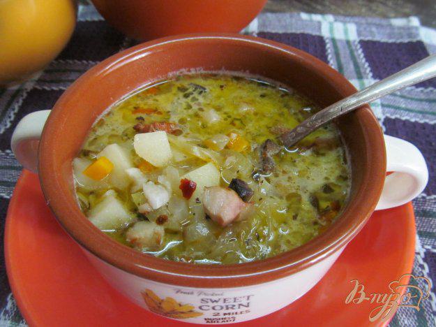 фото рецепта: Суп с маринованной капустой и грибами