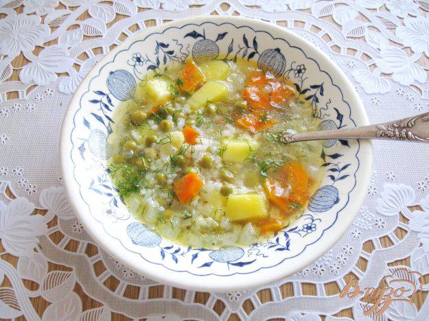 фото рецепта: Суп с рисом и зеленым горошком