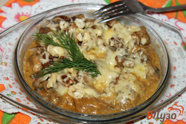фото рецепта: Куриное филе с грибами и орешками под сыром