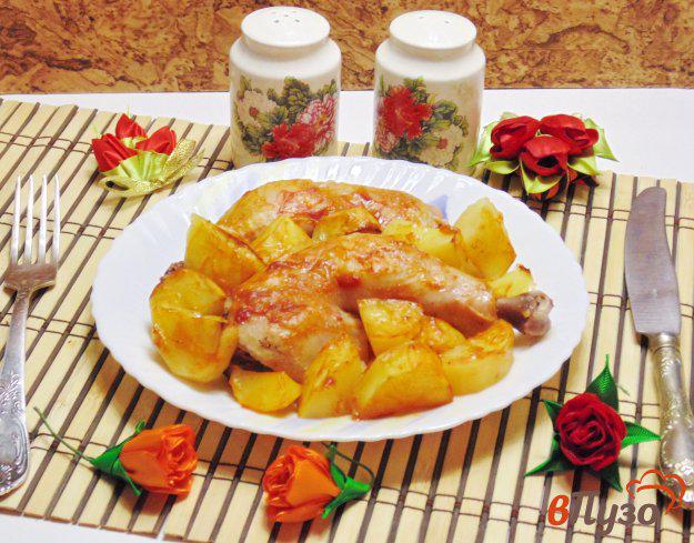 фото рецепта: Куриные окорочка запеченные с картофелем в соусе