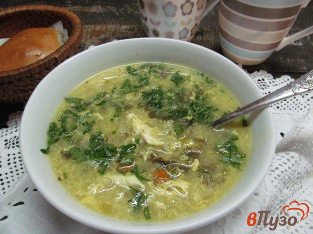 фото рецепта: Куриный суп с рисом и щавелем