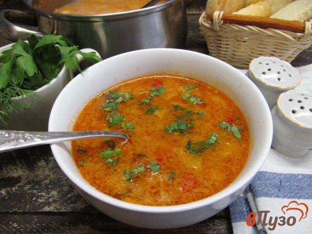 фото рецепта: Томатный суп с маринованной капустой и кукурузной крупой