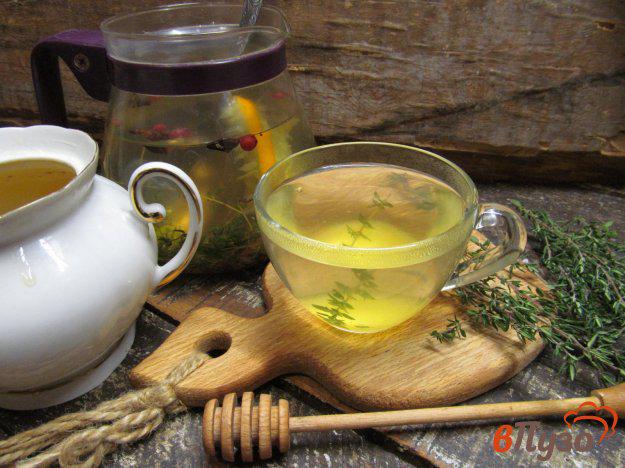 фото рецепта: Чай из тимьяна с клюквой и апельсином