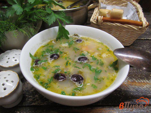 фото рецепта: Суп с оливками и квашеной капустой