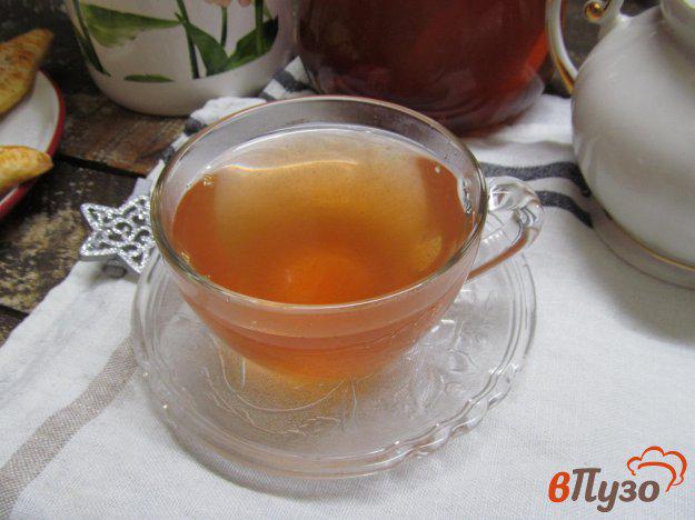 фото рецепта: Вишневый чай с изюмом и мандарином