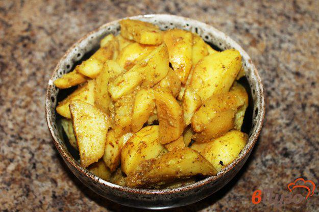 фото рецепта: Картофельные дольки в рукаве с чесноком и специями