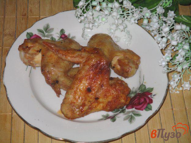 фото рецепта: Куриные крылья запеченные с аджикой