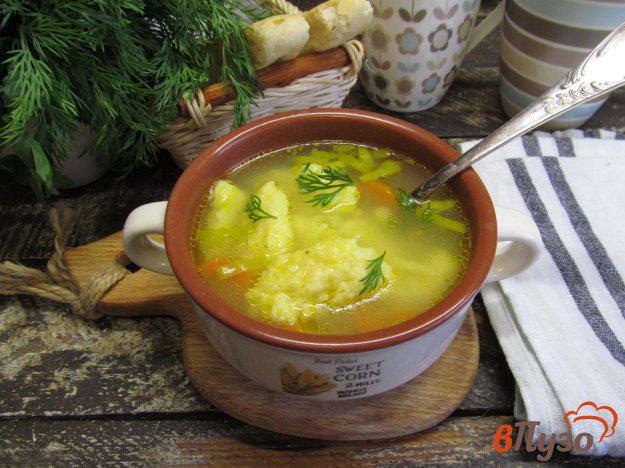 фото рецепта: Рисовый суп с клецками из сыра