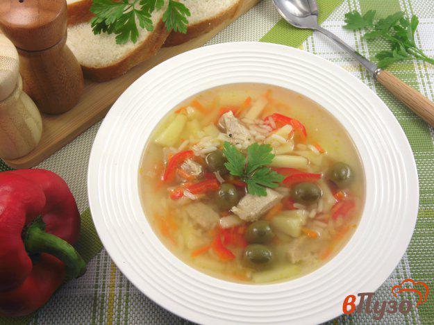 фото рецепта: Суп мясной с рисом и оливками