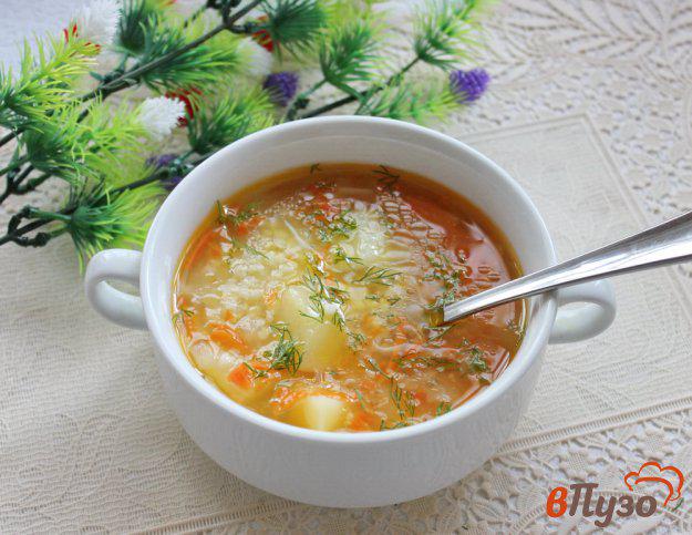 фото рецепта: Суп с рисом на рыбном бульоне