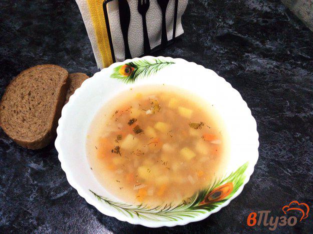 фото рецепта: Овощной суп с фасолью и тушенкой