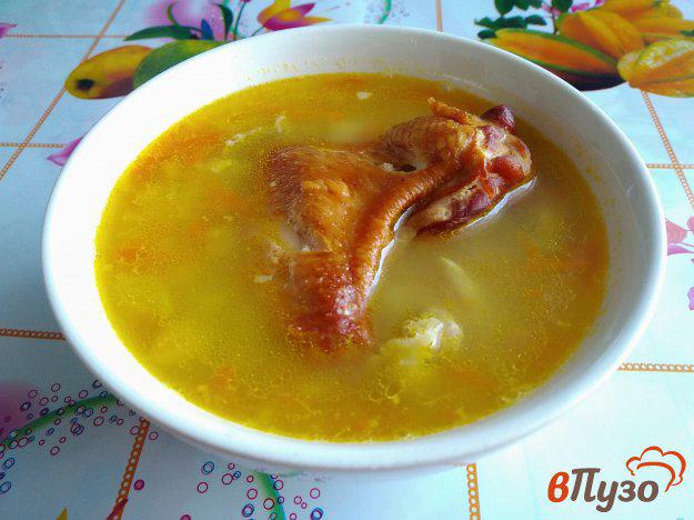фото рецепта: Суп из жёлтой чечевицы с капчеными крылышками